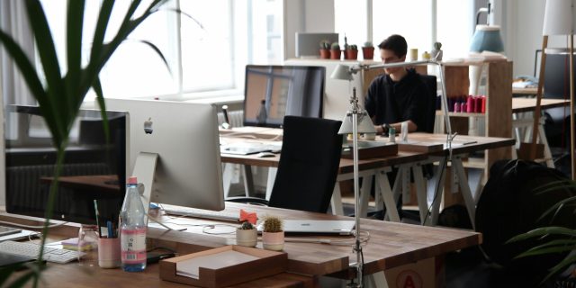 pexels-photo-380769-380769 Open-plan office with modern decor and natural lighting, ideal for productivity.